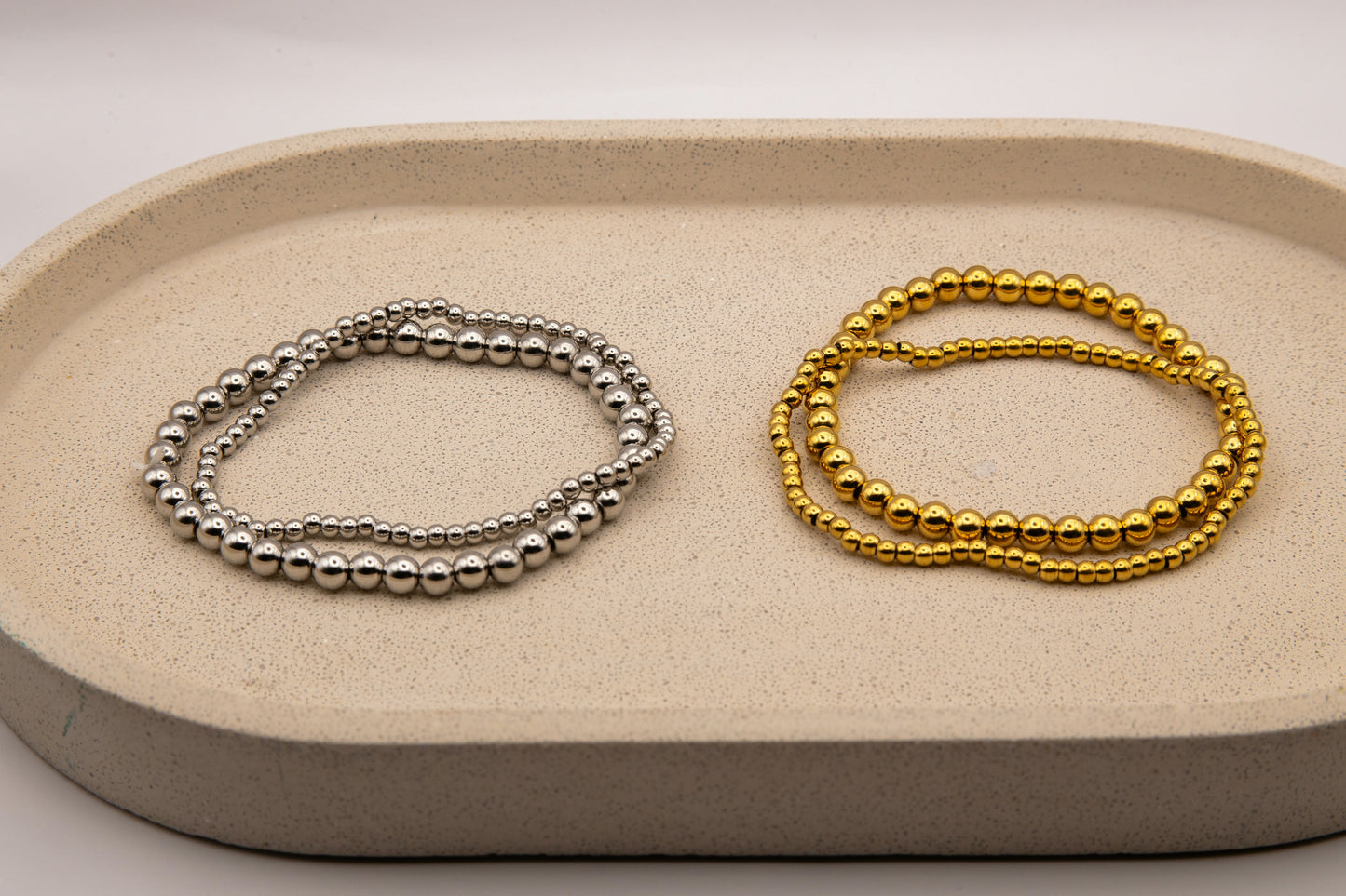 TWO BEADED STACKER BRACELETS